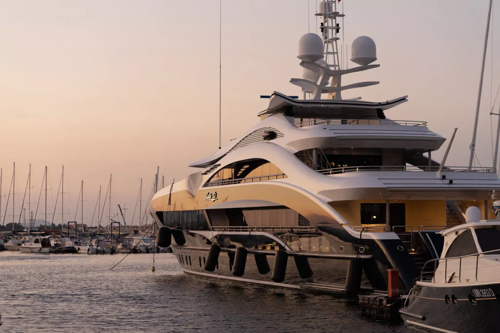 Image of a large yacht in a bay